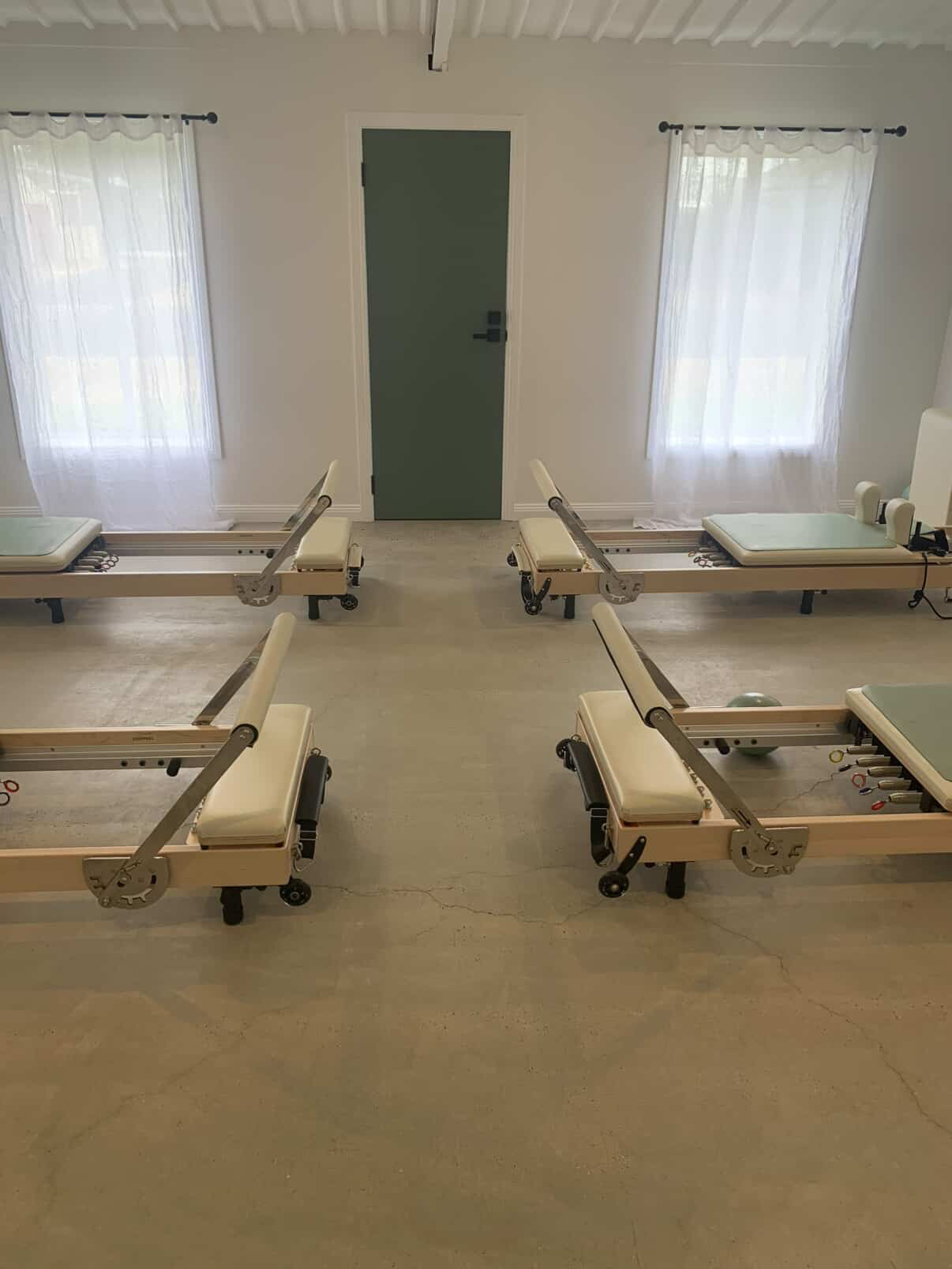 Core & Co. Pilates studio with reformers and natural light